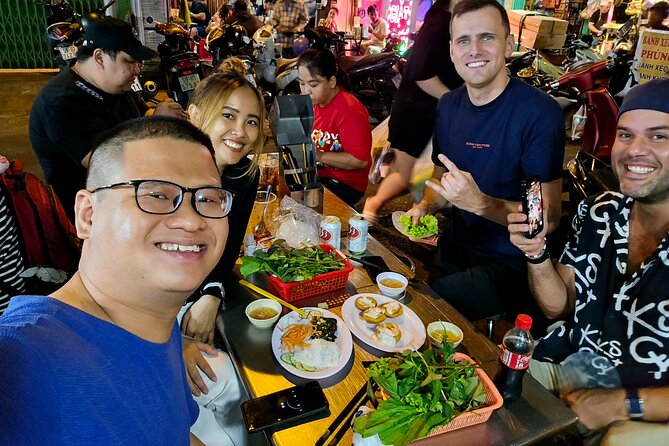 Unique Taste of Saigon Street Food Tour - Stop 1: rice paper salad, coconut or tropical juice, and a beer-and-beef starter