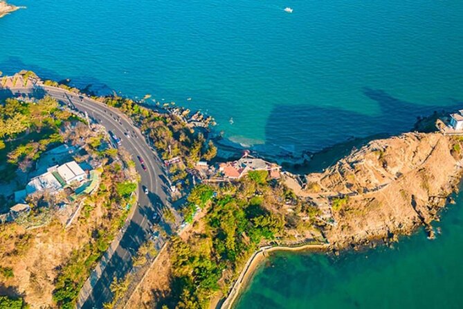 Vung Tau Full-Day Tour with Beach, Christ Statue & White Palace - Nghinh Phong Cape and the Gate of Heaven: Sea Breeze Photo Territory